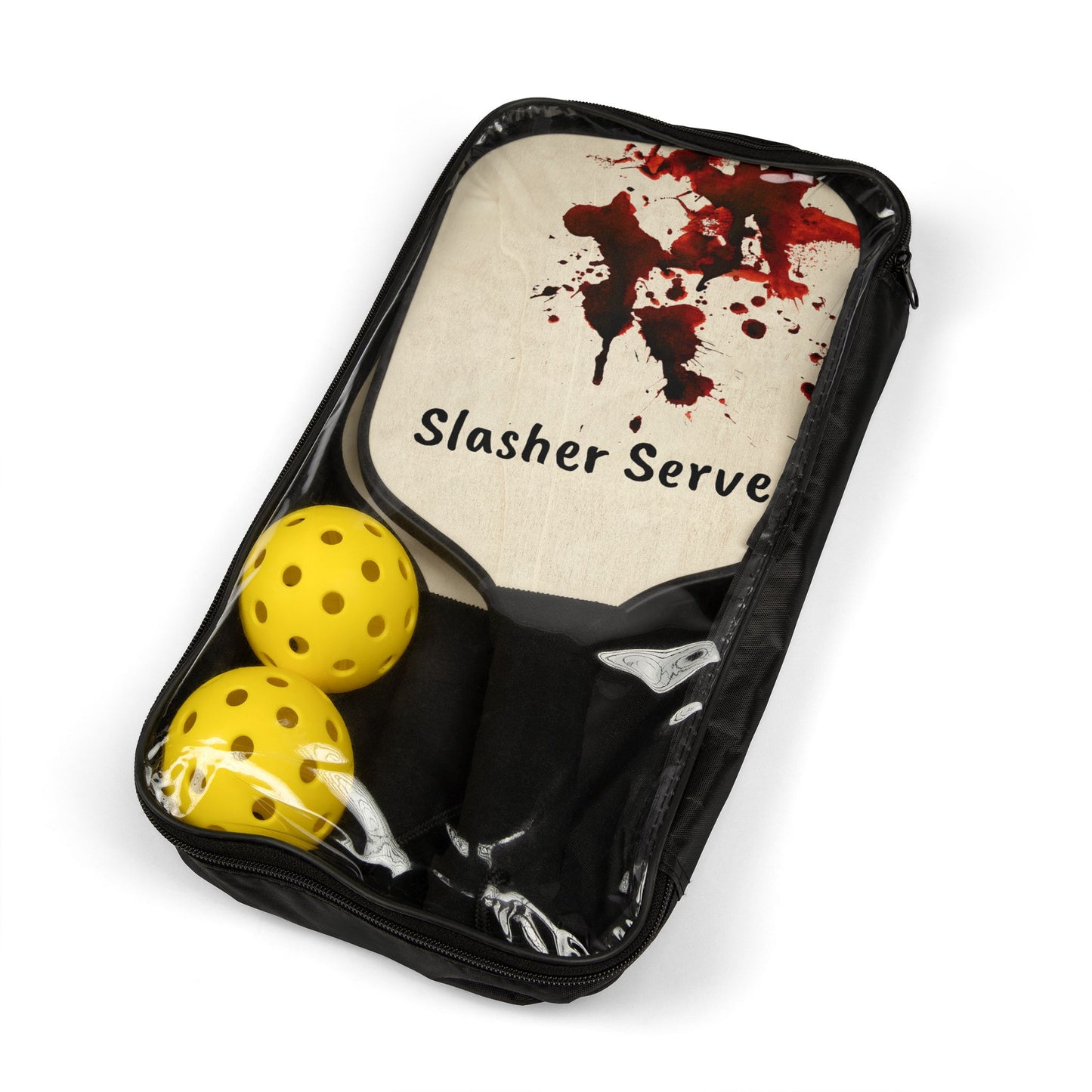Pickleball paddle with 'Slasher Serve' text and two yellow balls in a black case on a white background